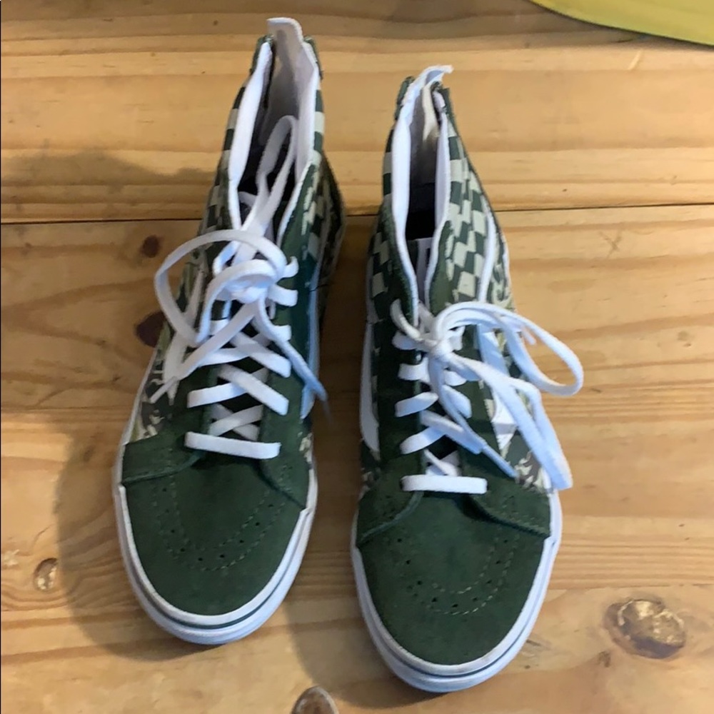 High top Vans.